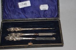 A cased silver manicure set with hallmarks for Birmingham
