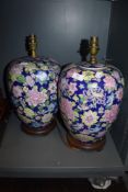 Two large modern Chinese table top lamp bases, having floral pattern on cobalt blue ground.