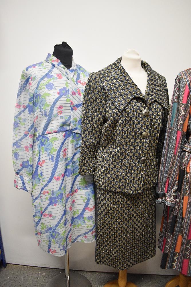 A mixed lot of vintage clothing, to include 1960s skirt suit, 1970s floral dress, 1970s paisley - Image 3 of 5