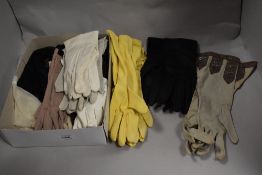 Seventeen pairs of vintage gloves, including three pairs of children's nylon gloves.