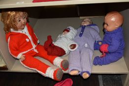 Three early to mid-20th century composition baby dolls, to include a Reliable composition and soft