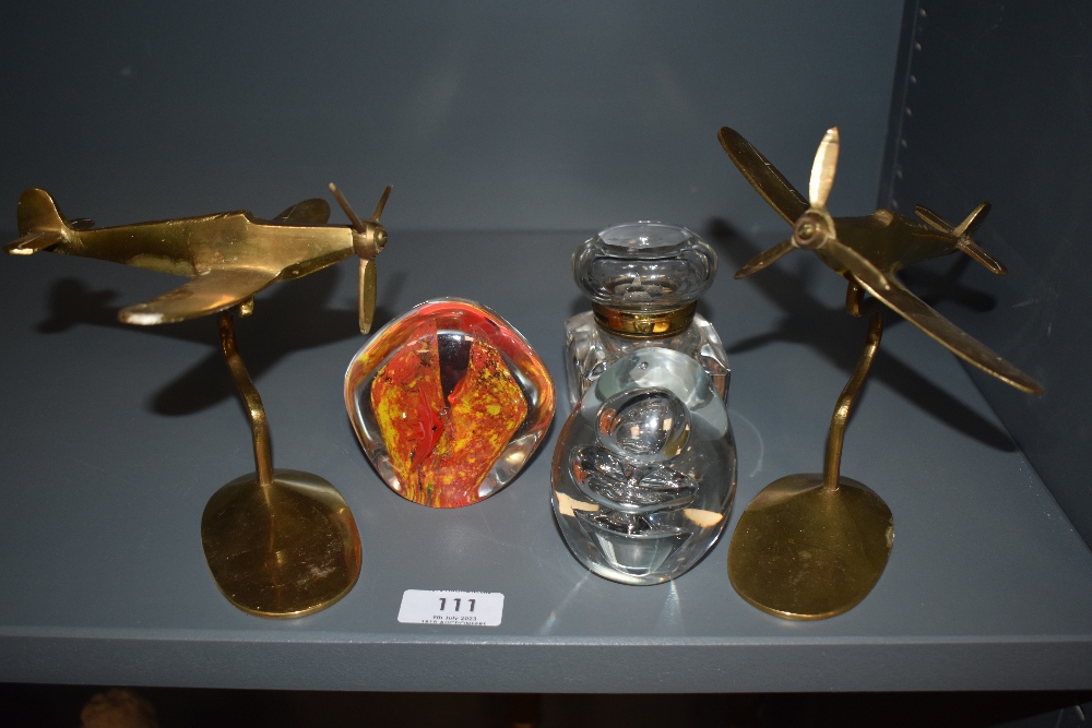 Two mid century brass Spitfires a Victorian ink well as found and two paper weights.