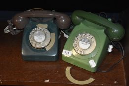 Two vintage plastic 1960s/70s Rotary telephones.