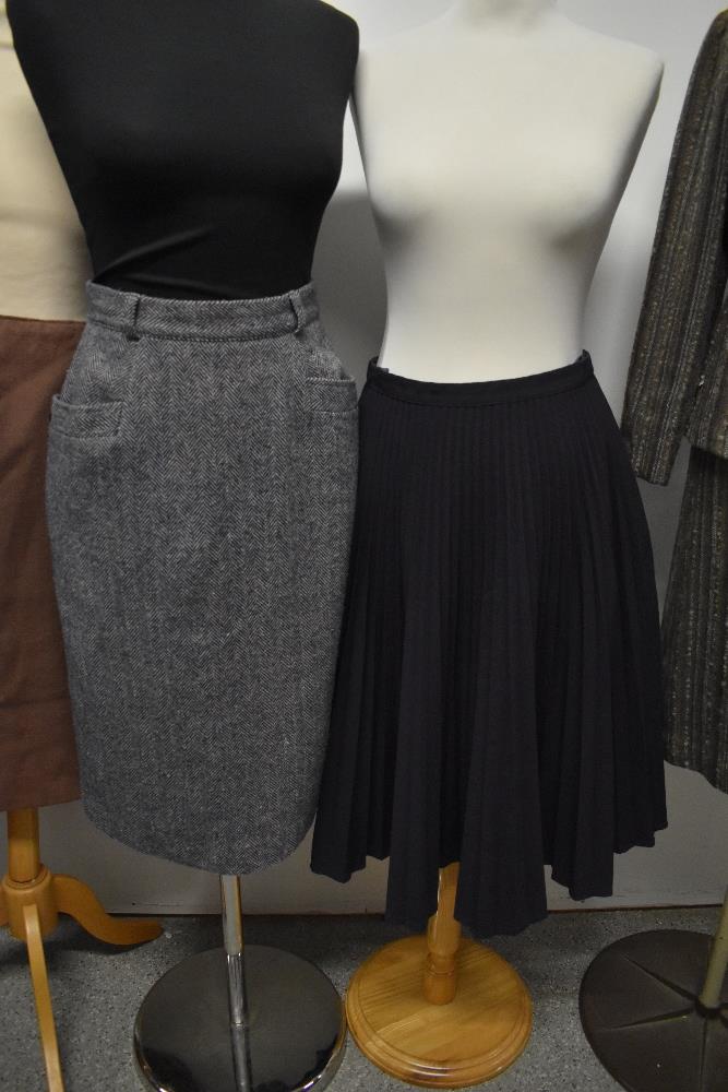 A vintage Windsmoor skirt suit and three skirts, including 1950s blue and grey herringbone and - Image 4 of 5