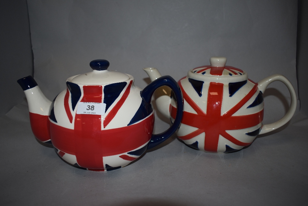 Two modern teapots decorated with Union Jack flags.