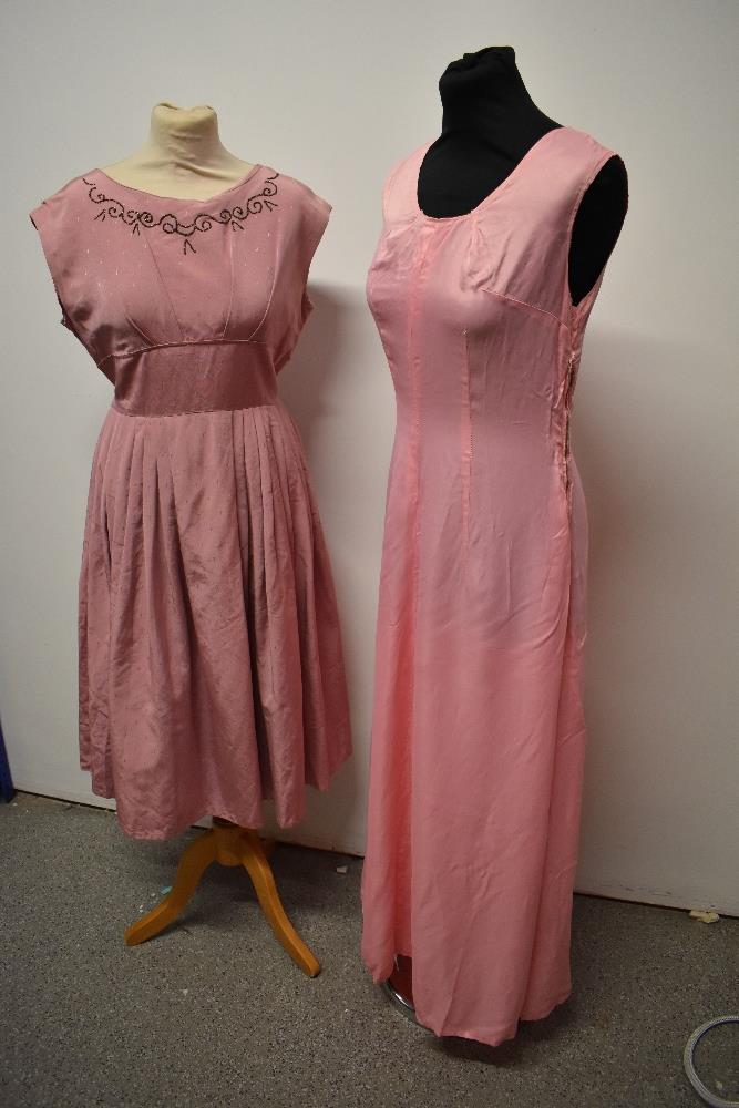 A 1950s grosgrain dress in rose pink, having full pleated skirt, beading to bust and half belt to - Image 3 of 8