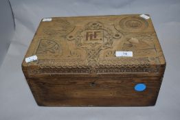 H.M.W Balaena interest* An interesting early 20th century carved pine box, of hinged rectangular