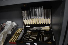 A vintage partial canteen of cutlery, including Harrison and company bone handled knives, EPNS forks