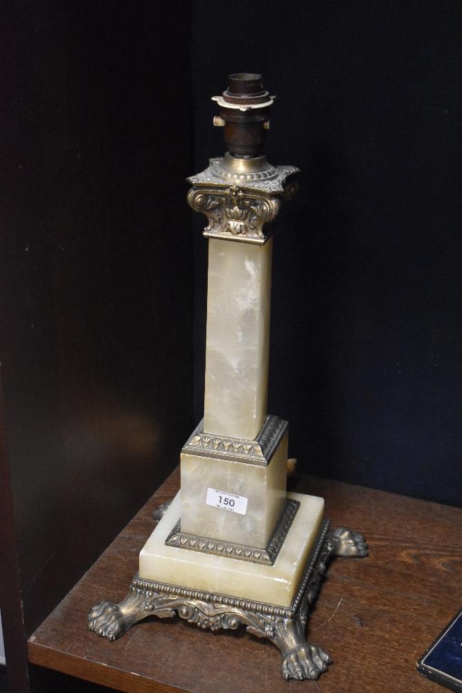A Victorian onyx and brass electrified table lamp, the Corinthian column on a square stepped base