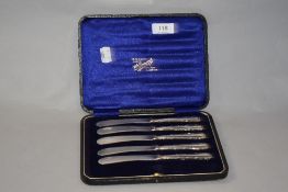 Five Hall marked silver handled butter knives in box.