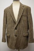 A gents 1970s Harris tweed jacket in green, brown and cream hues, tailored by St Michaels.