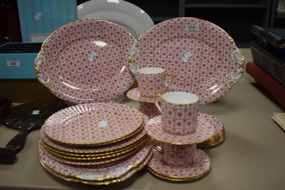 A Continental / Bavarian part tea service, on pink ground and decorated with a floral chintz style