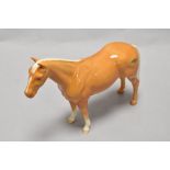 A Beswick pottery brown race horse study in gloss finish.