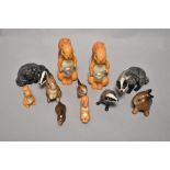 A group of Beswick pottery squirrels, comprising; 1007 standing, 1008 lying and 1008 with nut