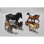 A group of Beswick pottery studies, including donkeys and pony, also horse on plinth, springtime, in