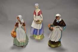 Three Royal Doulton figurines, to include Country lass HN 1991, The Milk Maid HN 2057A and Dawn HN