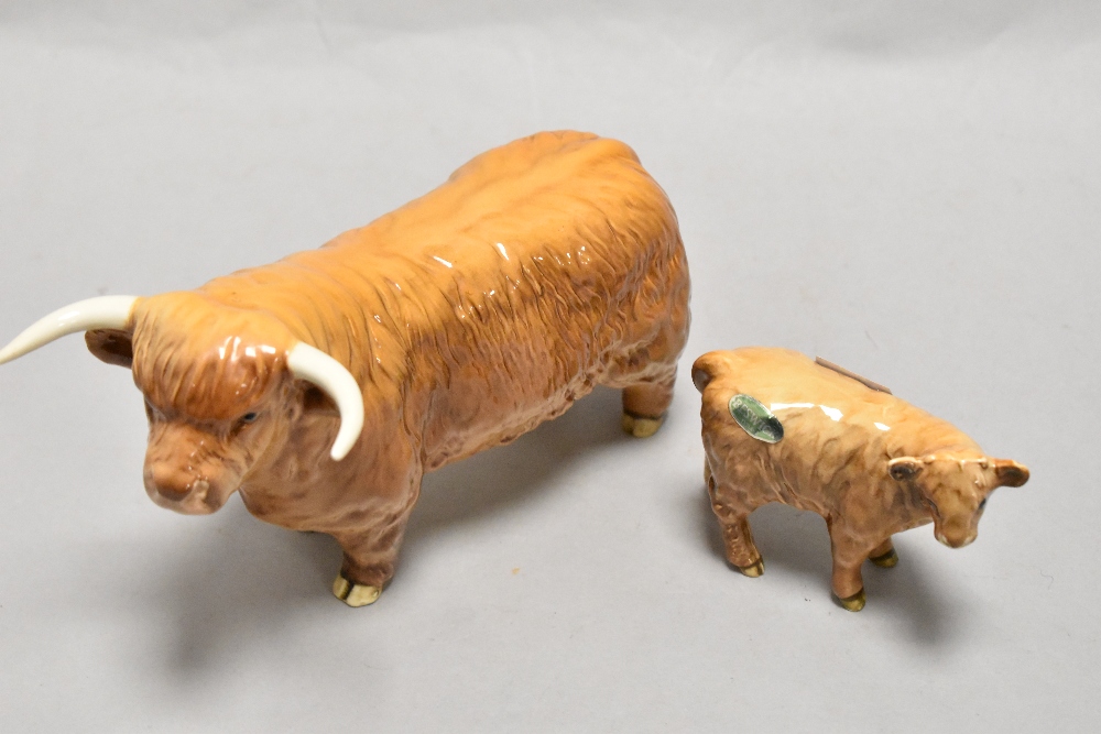 A Beswick pottery Highland bull 2008 and Calf 1827D.