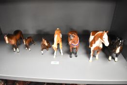 Seven Beswick pottery horse and foal studies, comprising; Pinto pony 1373 (skewbald) wooly