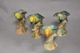 Four Beswick animal studies of Parakeets no. 930, one being overpainted and one being AF.