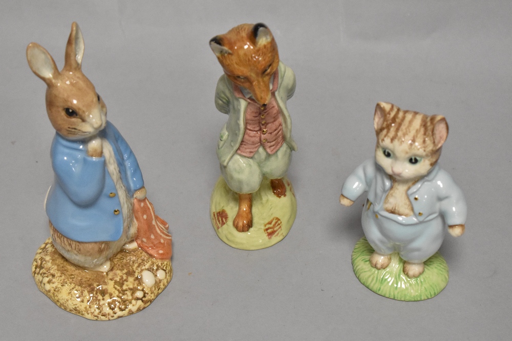 Three Limited edition Beswick pottery Beatrix potter studies; with gold Beswick back stamps,