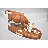 A Connoisseur Beswick Pottery Hereford cow and calf on plinth A2267, in matte finish.