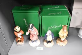 Four John Beswick Wind in The Willows figures including Toad WIW2, Badger WIW 3, Mole WIW 5 and