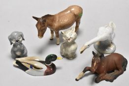 A mixed group of animal studies, to include; Beswick pottery donkey, horse, mallard and two cats,
