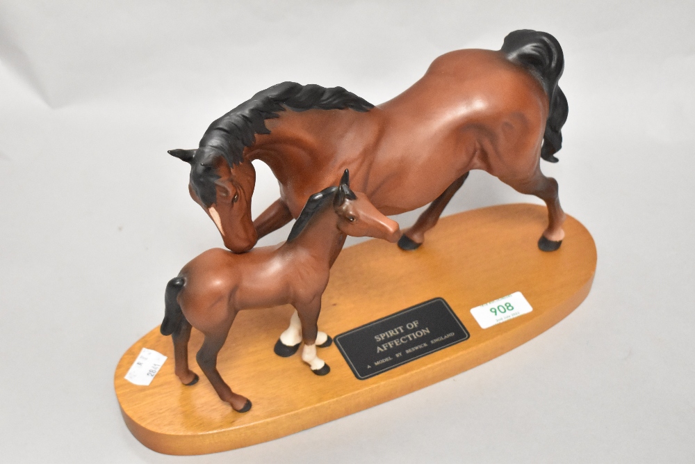 A Beswick pottery mare and foal study on wood plinth, Spirit of Affection,in matte finish.