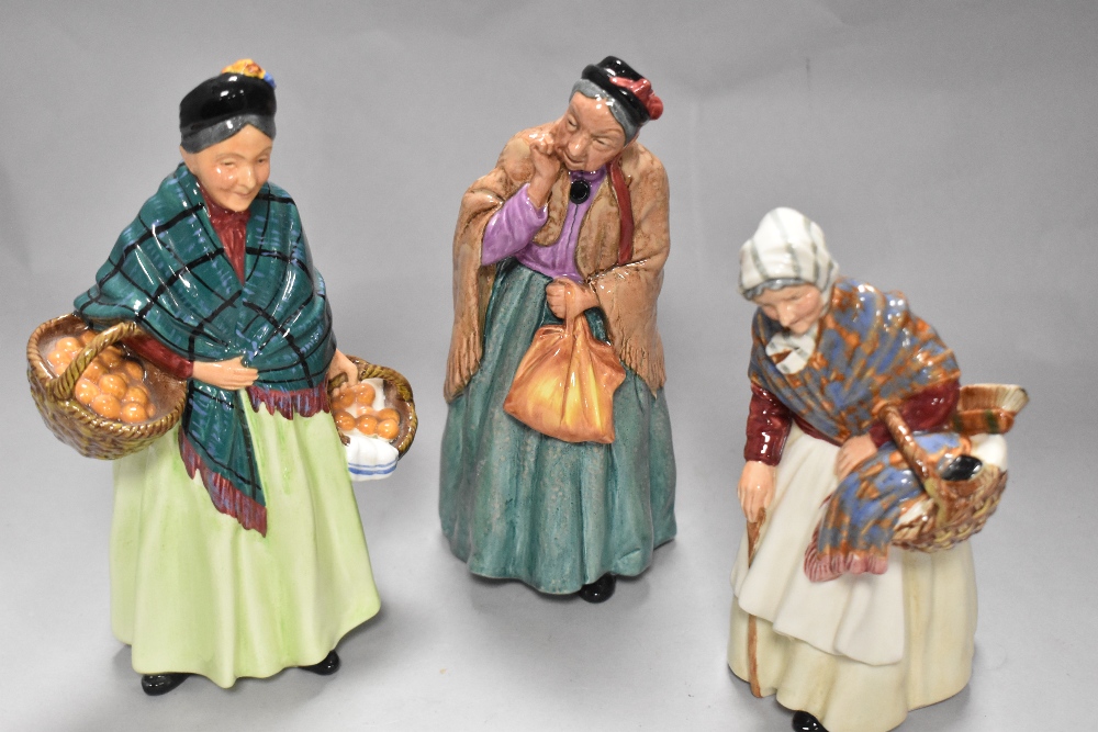 Three Royal Doulton figurines, To include; Grandma HN 2052, Bridget HN 2070 and the orange lady HN
