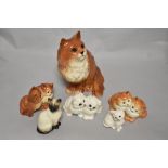 A group of Beswick pottery cat studies, to include; Persian 1867 (ginger) Siamese seated 1887,