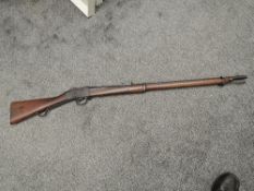 A Martini Henry Long Lever Rifle, made by Enfield, Top loader, Ram Rod present, Crown VR Enfield