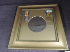 A WW1 British War Medal, Victory Medal and Memorial Plaque to 28942 Pte.W.J.Wenmouth.R.War.R in