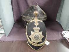 A late 19th/early 20th century Army Veterinary Corps Black Cloth Ball Toped Helmet with helmet plate