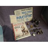 A collection of Militaria including WW2 Daily Express War Map of the Pacific, Map Book of the