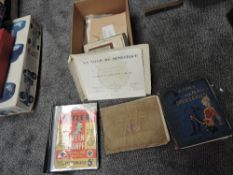 A box containing Military Ephemera including Hitler's Mein Kampf in 18 weekly parts 1939 full set,