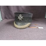 A Sherwood Foresters black cloth Forage Cap having gold braiding to visor, gold woven dome on top,