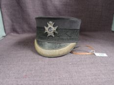 A Sherwood Foresters black cloth Forage Cap having gold braiding to visor, gold woven dome on top,
