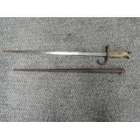 A French Gras Rifle model 1874 Bayonet in script 1879 with metal scabbard, blade length 52cm,