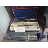 Three Masonic Daggers, two boxed and one in bag, Masonic Dagger in fitted case with scabbard and