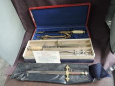 Three Masonic Daggers, two boxed and one in bag, Masonic Dagger in fitted case with scabbard and