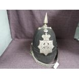 A late 19th/early 20th century 1st Volunteer Battalion Border Regiment Cloth Spiked Helmet, having