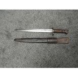 A British Lee-Mertford Mk1 1888 Bayonet, marked EFD and other marks with leather scabbard and