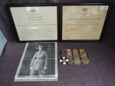 A WW1 Distinguished Service Order and 1914 Trio, 1914 Star Mons Clasp, British War Medal & Victory