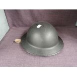 A WWII British Chaplain/Padre Steel Helmet with leather liner and webbed chin strap