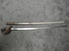 An early 20th century Slovakian/Czechoslovakia Military Sword having slightly curved blade, brass