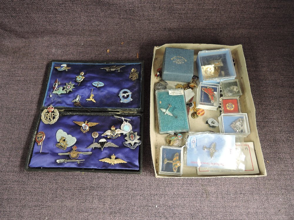 A collection of Military Sweetheart Brooches, vintage and modern in a case and a box, some af