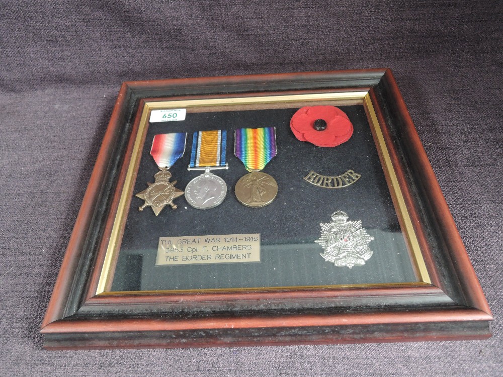 A WW1 Trio, 1914-15 Star, British War Medal and Victory Medal plus Poppy, Border Regt Shoulder & Cap