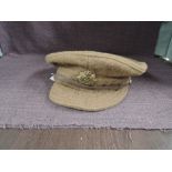 A WWI British Army Cap having ASC Army Service Corps Badge, marked inside with Military Arrow,