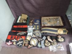 A collection of Royal Air Force Sweetheart Brooches, metal & cloth Badges, Arm Bands, Belt & Buckle,