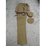 A WWII period Military Jacket, Trousers and Beret Border Regiment, Jacket has metal pips to